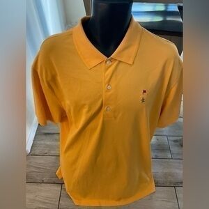 Men’s used Greg Norman play dry yellow orange golf shirt sewn polo  logo size XL